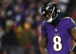 Lamar Jackson disputes Troy Aikman’s trademark bid for No. 8