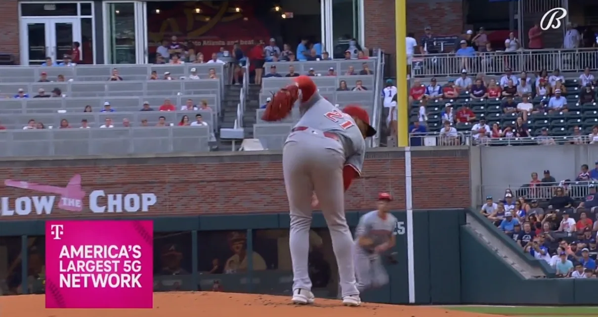 Reds' Hunter Greene makes a slick behind-the-back grab and throws out the runner against the Braves