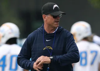 Chargers coach Jim Harbaugh’s workout video adds to viral offseason