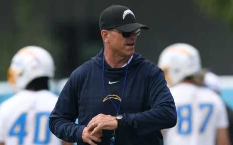 Chargers coach Jim Harbaugh’s workout video adds to viral offseason