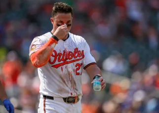 Orioles’ James McCann remains in game after fastball to face