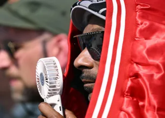 Snoop Dogg wows crowd at sizzling Olympic beach volleyball venue