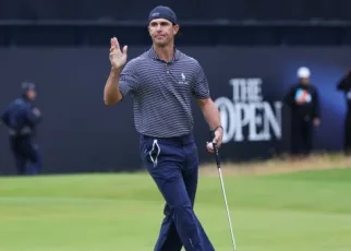 American Horschel leads British Open on wild day of rain and big numbers