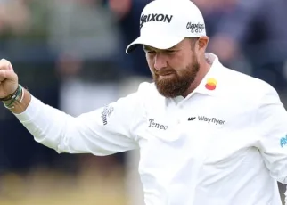 Shane Lowry keeps calm and carries British Open lead into weekend