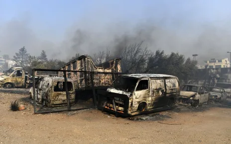 One dead and homes burnt to ground as fires die down in Greece