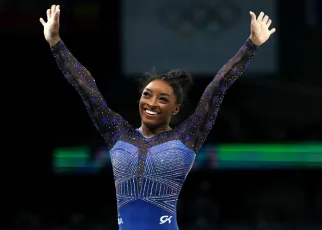 Simone Biles wins Olympic all-around title; bronze for Suni Lee