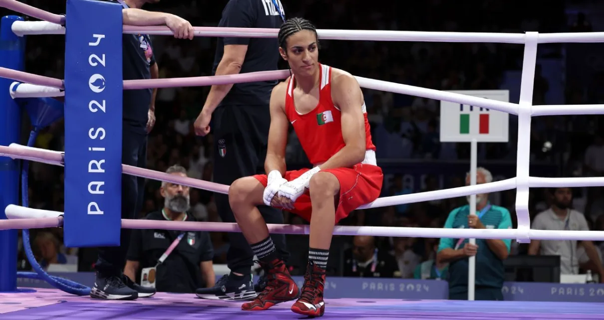 Boxer who faced gender questions wins when rival quits fight