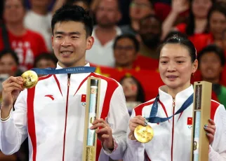 Tokyo Games silver medalists take gold in mixed doubles badminton