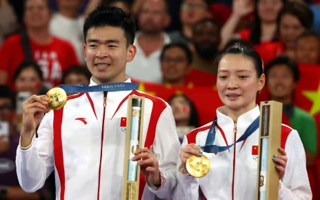 Tokyo Games silver medalists take gold in mixed doubles badminton