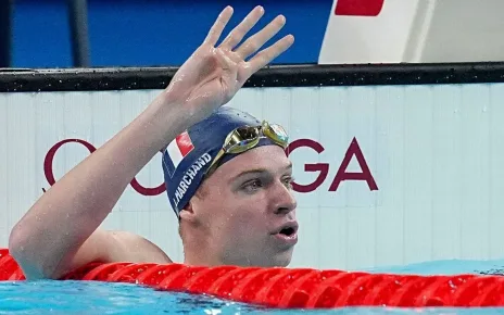 Marchand wins 200m IM for fourth gold; McEvoy wins 50 free