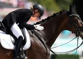 Jessica von Bredow-Werndl defends Olympic title in dressage