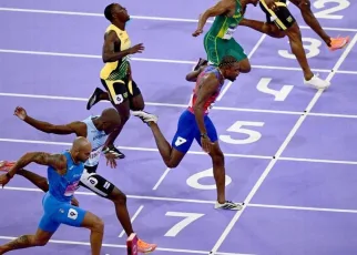 Noah Lyles wins gold for U.S. in 100m by .005 seconds