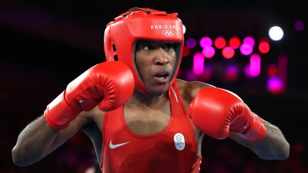 Boxer Cindy Ngamba loses, but Refugee Team gets 1st Olympic medal