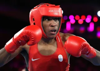 Boxer Cindy Ngamba loses, but Refugee Team gets 1st Olympic medal