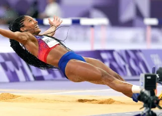 Americans Tara Davis-Woodhall, Grant Holloway secure gold medals