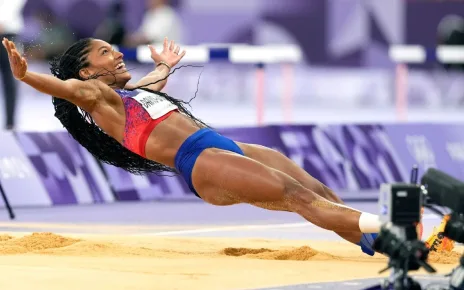 Americans Tara Davis-Woodhall, Grant Holloway secure gold medals