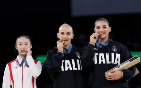 Chinese Olympic medallist returns from Paris to wait tables at family restaurant