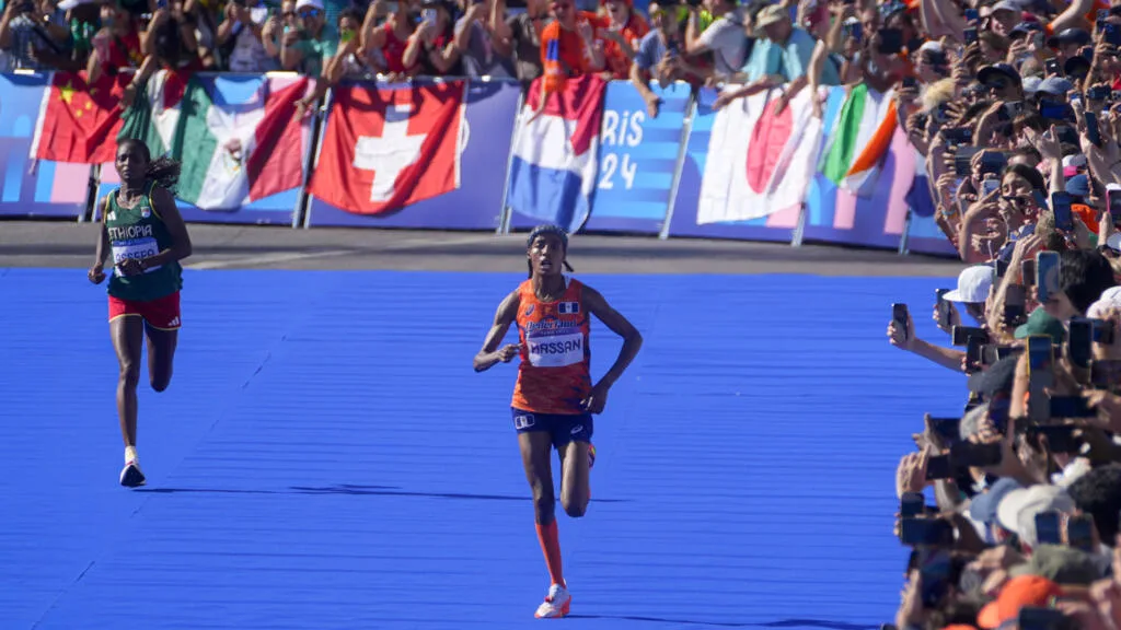 Netherlands’ Hassan wins Olympics women’s marathon with sprint finish