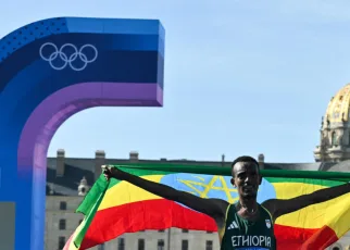 Ethiopia’s Tola wins Olympic marathon as France hope to dethrone US in basketball