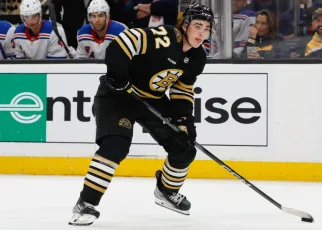 Harrison pushing to break camp with Bruins after getting established as pro