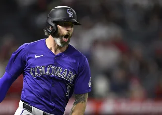 Jake Cave homer propels Rockies to extra-innings win