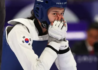 Yujin Kim: From grandmother’s advice to Olympic title