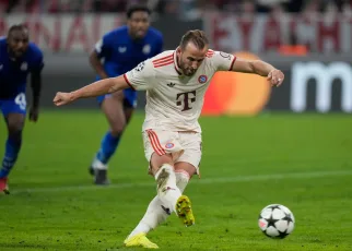 Harry Kane salutes Wayne Rooney after breaking English Champions League record