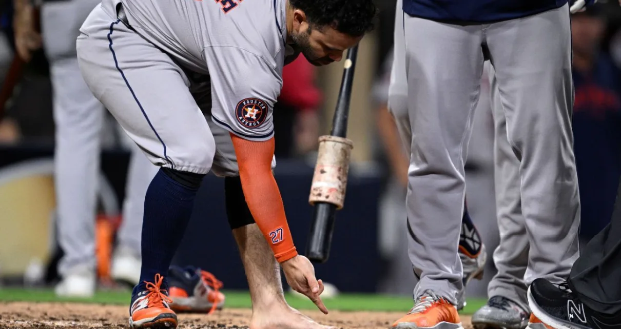 Jose Altuve tossed for removing cleat, sock in wild Astros win