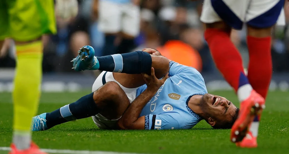 Manchester City rocked by Rodri injury as Spain star limps out of Arsenal clash in pain