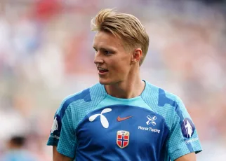 Arsenal’s Martin Odegaard limps out of Norway win with apparent ankle injury