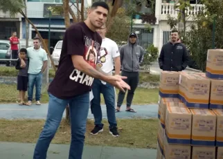 Video | Alex Pereira donates truckload of food to the needy in his hometown