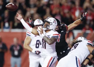 Arizona scores 23-10 upset win over No. 10 Utah as Cameron Rising watches from the sideline again