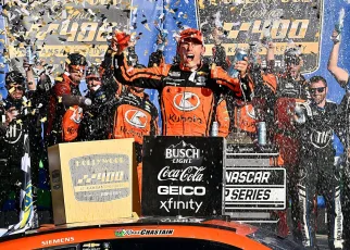 Ross Chastain holds off William Byron to win in Kansas