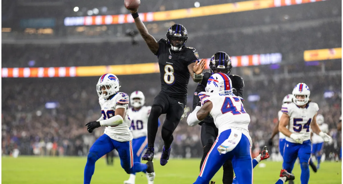 Ravens crush Bills to cap wild NFL weekend; inside Georgia vs. Alabama; MLB playoff field nearly complete