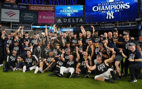 Yankees and Dodgers clinch division titles; Cowboys beat Giants but lose key players