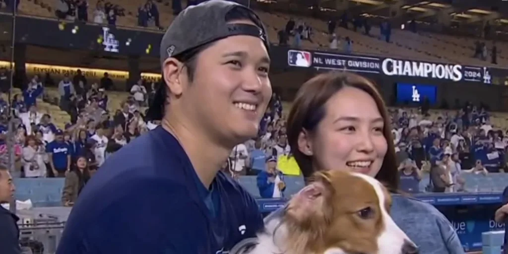 Shohei Ohtani and dog, Decoy, celebrate NL West title