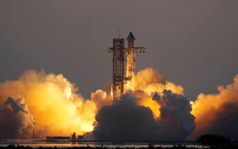 SpaceX catches Starship rocket booster as it returns to Earth