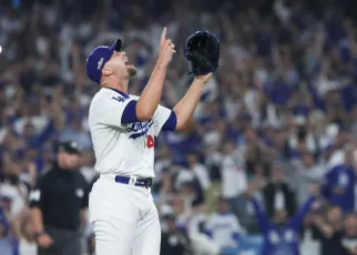 Plaschke: Take that! Vengeful Dodgers roar in postseason opening win over reeling Padres