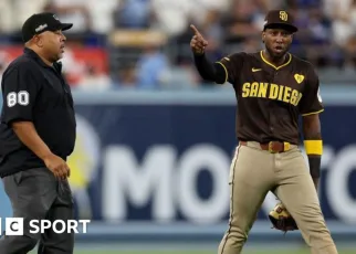 LA Dodgers-San Diego Padres game delayed after fans throw baseballs and beer at Jurickson Profar